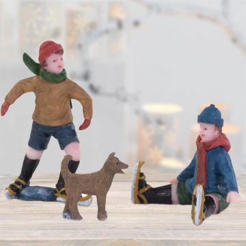 Jongens en de hond op het ijs